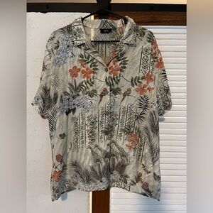 Button down shirt. Fits like a large.